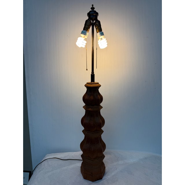 Design Plus Gallery presents a Carved Table Lamp of Solid Wood from the Mid 20th Century. The column is entirely made of...
