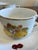 A delightful vintage Seltmann Weiden Bavaria porcelain tea cup and saucer set featuring assorted fruit motif artwork and...
