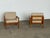 A pair of Danish teak lounge chairs, 1960s. Solid teak frames with a clean, open construction that reads well from every...