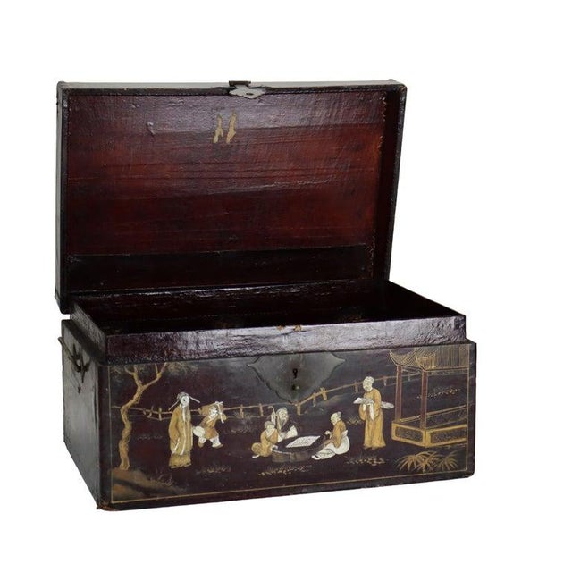 An antique Chinese document box, dating to approximately 1890, features a rich polychromed Chinoiserie decoration. Crafted...