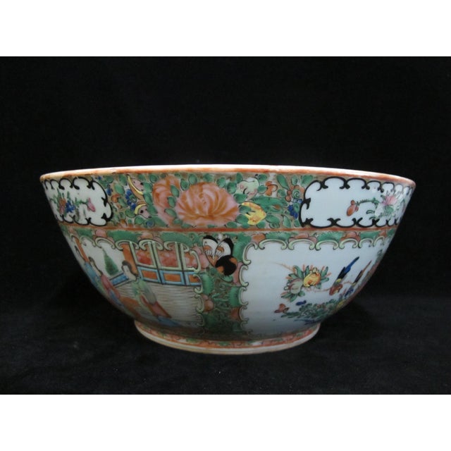 19th Century Chinese Famille Rose Medallion porcelain serving bowl. Features hand painted alternating panels of brightly...