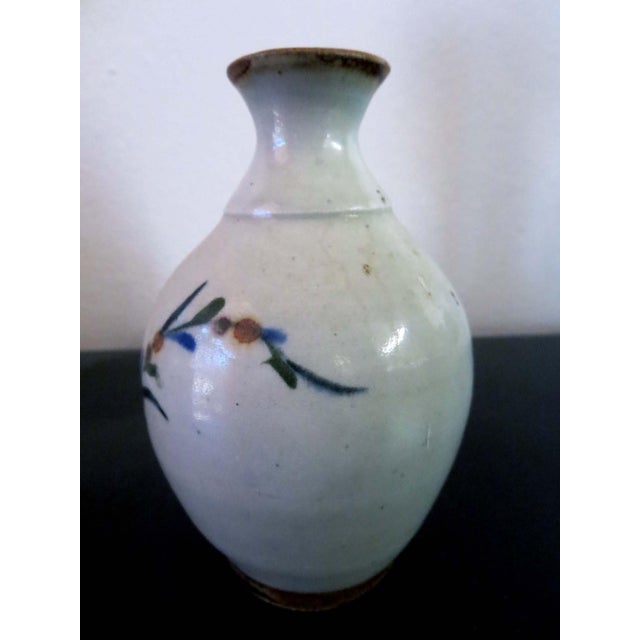 Sweet little handturned, handpainted & signed vase from Tonala, Mexico, an area reknowned for its pottery. Features a...