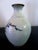 Sweet little handturned, handpainted & signed vase from Tonala, Mexico, an area reknowned for its pottery. Features a...