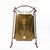 This decorative copper and wrought iron fire screen brings a stylish and unique touch to your living room or den.