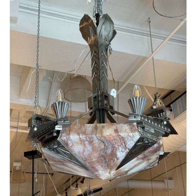 Design Plus Gallery presents Circa 1920's Antique French Art Deco Chandelier. Dating to the Art Deco period, this...