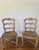 A pair of Mid 20th C French Provincial Revival style ladder back dining chairs with craquelure painted hardwood, painted...