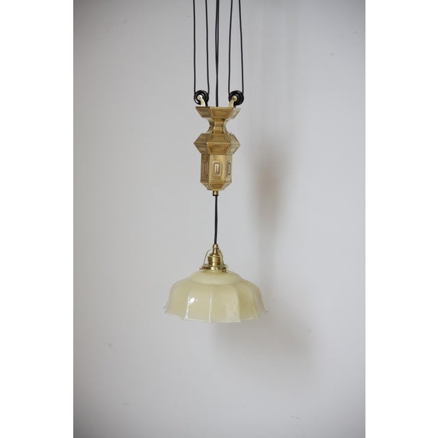 Lovely piece in excellent condition. All but cable original, cleaned, polished, exceptionally well preserved. Layered...