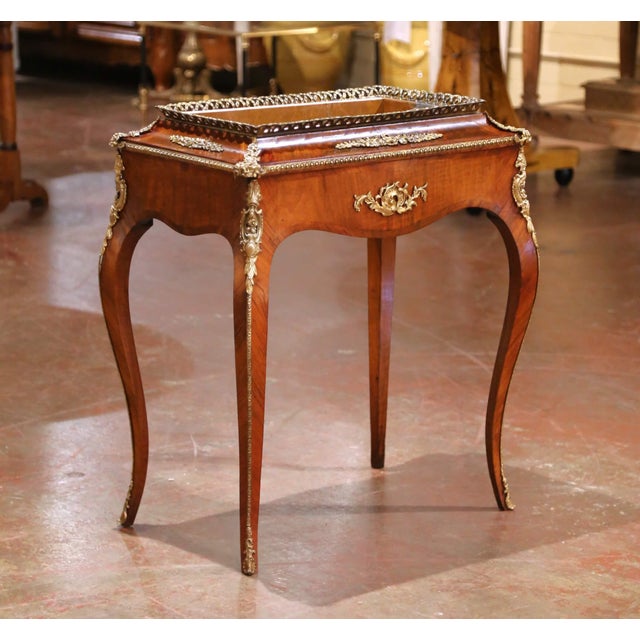 Crafted in France circa 1860, this elegant 19th century jardinière is a fine example of the Louis XV style. The shaped...
