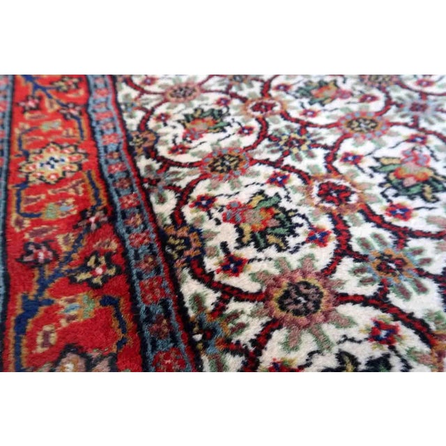 Handmade vintage Indian Mahal rug in all-over design. The rug is from the end of 20th century, it is in original good...