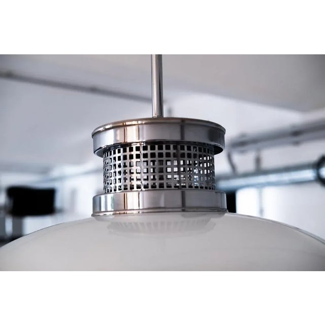 Hanging lamp in Jugendstil (inspired by Josef Hoffmann), chromed brass, opal dome shade This piece is designed in the...