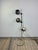 A vintage floor lamp from the 1970s, emblematic of the Space Age era. with its fluid lines and graphic design, it will fit...