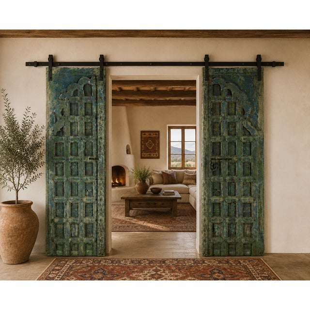This Antique Indian Painted Teakwood Door is handcrafted from solid teakwood, the door features a deeply carved grid...