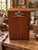 Wonderful antique circa 1920s–1930s wooden clipboard storage box, combining a functional writing surface with an enclosed...