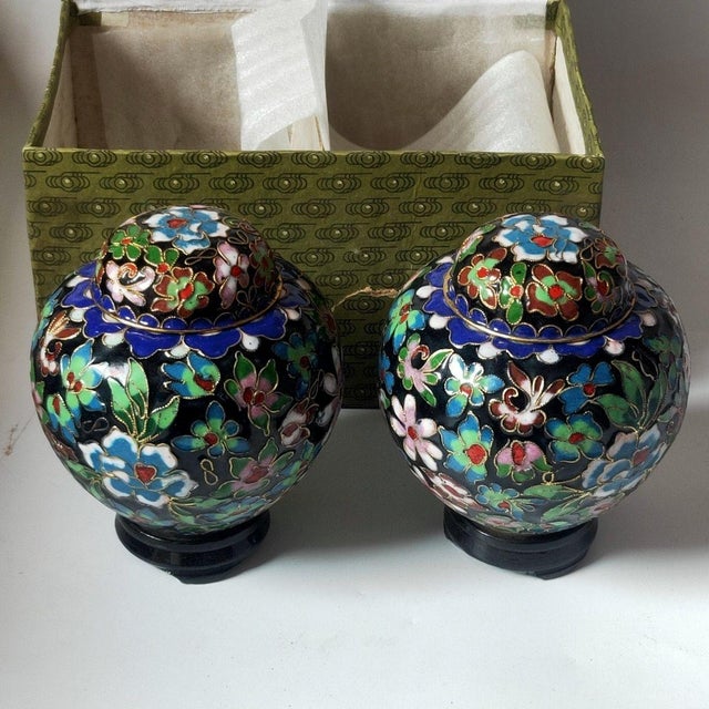 This is a striking pair of vintage cloisonné enamel tea jars , complete with their original patterned presentation box and...