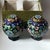 This is a striking pair of vintage cloisonné enamel tea jars , complete with their original patterned presentation box and...