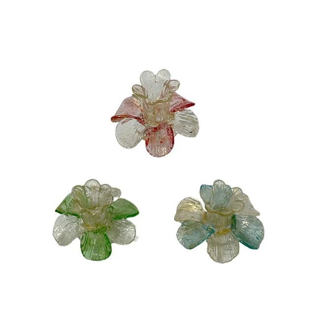 A mid-20th century Italian Murano gold flake candleholders in flower shape. A flower chalice, containing the candle with 6...