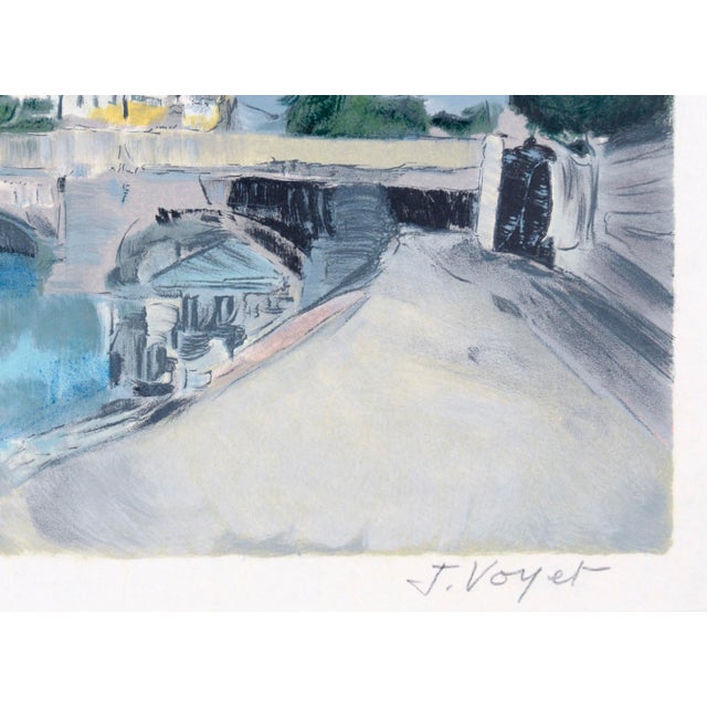 "Bord de Fleuve" Impressionist Landscape of Riverside Paris, Lithograph on Paper (#86/90) A stone arch bridge spans the...