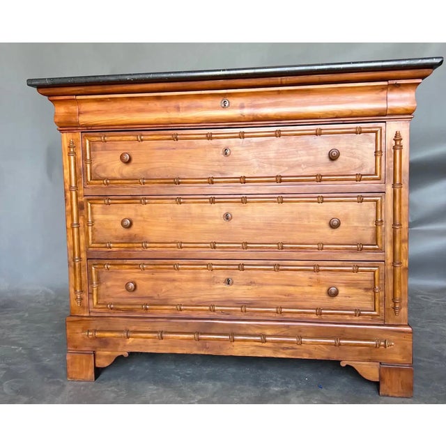 Gorgeous full-sized 19th-century French faux bamboo 4-drawer chest with original black marble top. Complimentary shipping...