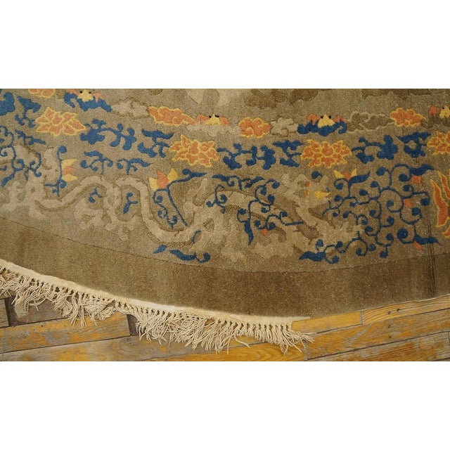 Excellent Tan-Camel Background in a Chinoiserie Pattern Antique Oval Chinese Peking Dragon Rug For Sale - Image 10 of 12