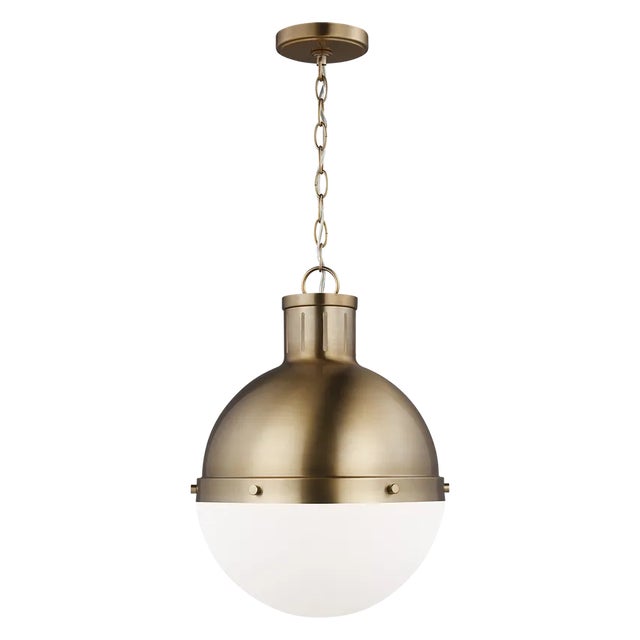 The Hanks medium modern pendant is offered in the Midnight Black/Satin Bronze, Antique Brushed Nickel, Satin Bronze, or...