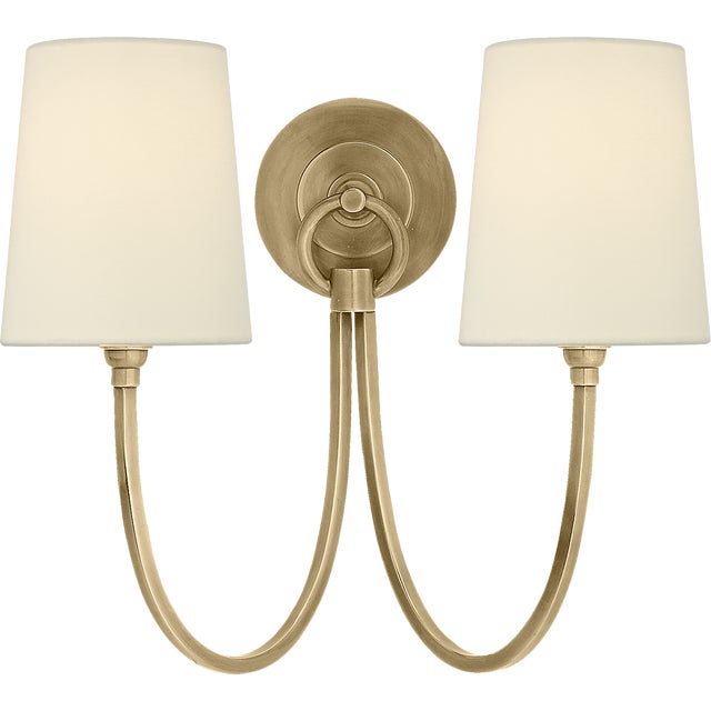Reed Double Sconce in Hand-Rubbed Antique Brass with Linen Shades Designer: Thomas O'Brien Finish: Hand-Rubbed Antique...