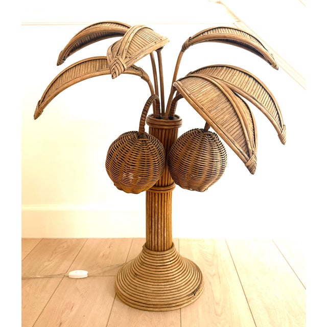 Attributed to Mario Lopez Torres. Split reed rattan table lamp in the form of a palm tree. 6 palm fronds. These are...