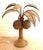 Attributed to Mario Lopez Torres. Split reed rattan table lamp in the form of a palm tree. 6 palm fronds. These are...