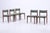 A beautiful set of five Danish dining chairs by Knud Faerch for Bovenkamp. The clean lines, slender proportions, and...