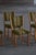 A beautiful set of six sculptural dining chairs in solid oak by Henning (Henry) Kjærnulf, Denmark, 1960s. The chairs carry...