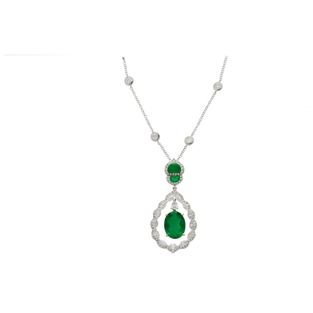 Early 21st Century 6.42 Carat Floating Emerald with Diamond & Emeralds in 18K Pendant Necklace For Sale - Image 5 of 12