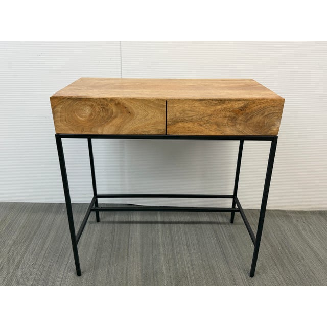 Design Plus Gallery presents the Mango Wood Mini Desk from West Elm. This compact workspace maximizes organizational...