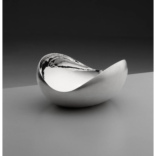 This bowl is made of silver alloy with a polished interior and the satin CORTECCIA texture on the outside.