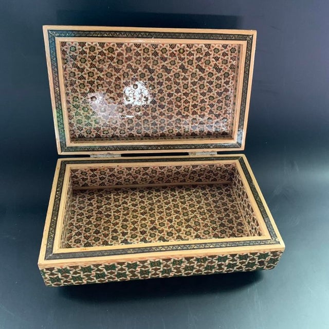 An exquisite vintage Persian Khatamkari decorative box featuring an incredibly detailed, all-over micro-mosaic marquetry...