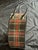 This vintage tartan plaid hat box would make a very cool as well decorative place to store a retro chapeau or anything...