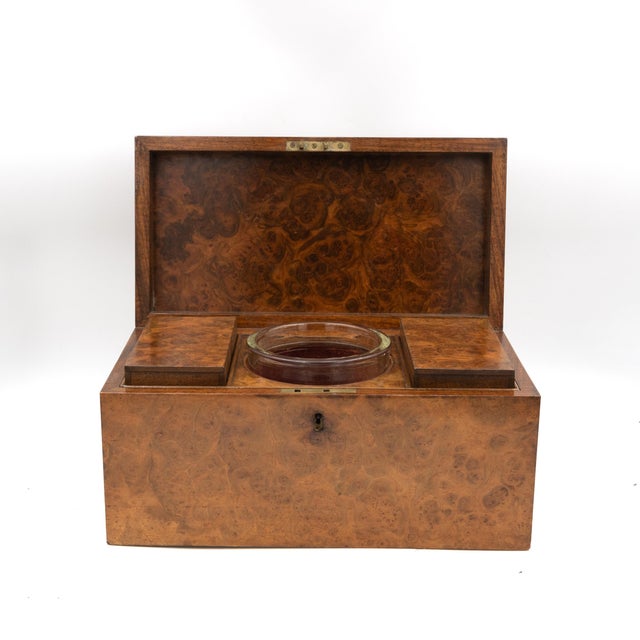 Large scale George III period burr yew wood tea caddy of rectangular form with cast brass ring handles, hinged lid...