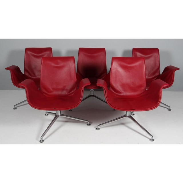 Preben Fabricius & Jørgen Kastholm tulip lounge chair in indian red leather Frame of brushed steel. Made by Walter Knoll....