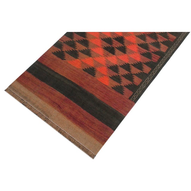 "Add a touch of elegance to your home with this Vintage tribal Kilim rug. Constructed on a loom by Nomad Turkman people...