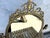 Elegant vintage brass tabletop vanity mirror featuring a richly ornamented Rococo Revival design with strong Hollywood...