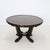 An Art Deco period cocktail table featuring a beautifully veneered recessed top. The tables stands on four heavily carved...