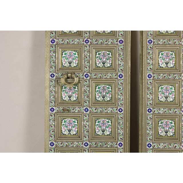 This pair of antique Indian decorative panels features a striking metal-clad construction over a wood core, with colorful...