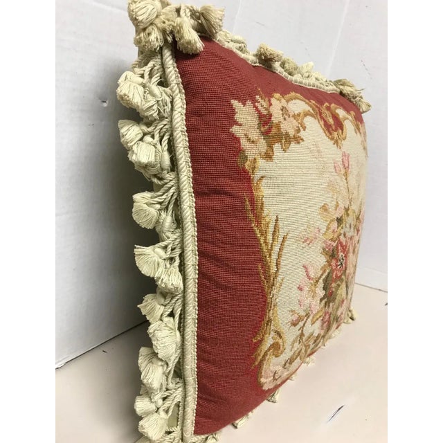 Vintage Wool thread needlepoint pillow with zipper closer and down and feather insert. Tassel fringe in a neutral beige...