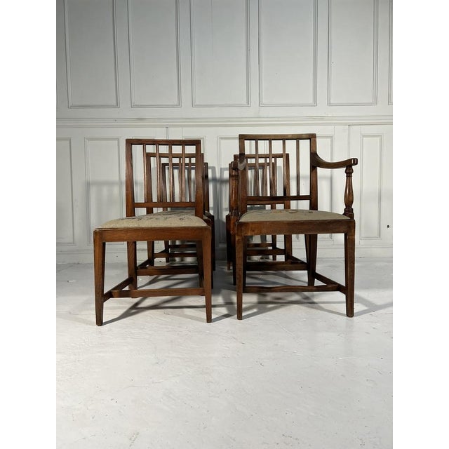 Set of 6 dining chairs (1 carver). Late 19th century Scottish chairs with drop in seats. Constructed from Ash with hand...