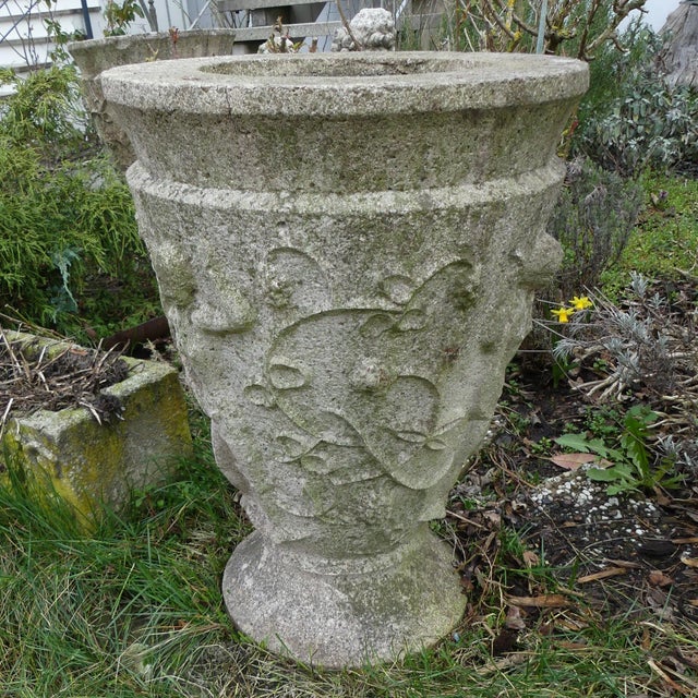 Decorative large stone pouring vessel, surrounded by a dancing rack. Height 70 cm, diameter 49 cm. Inner size height 24...