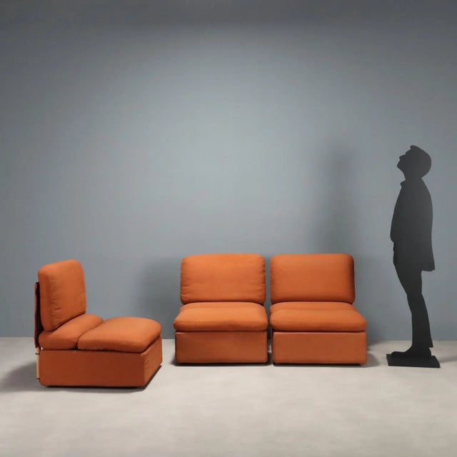 Set of vintage armchairs, also usable as a three-seater sofa, with foam padding and original fabric upholstery in brick...