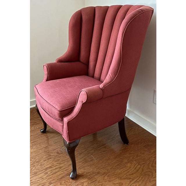 Mid 20th century channel back vintage upholstered chair in very beautiful and excellent condition. Has original wood...