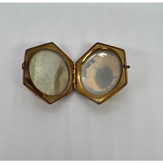 Set of four makeup cases from the 1920s. Inlaid & Enameled cases. Some with mirrors inside. Rare to find this many...