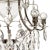A nickel bathroom chandelier with full cut crystal orbs in the arms and cut crystal baroque almonds. The light bulb for...