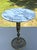 Offering for sale this exceptional vintage pedestal table featuring a white Italian marble top with gray veining and an...
