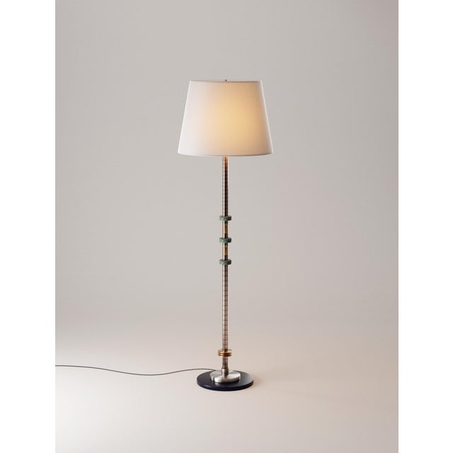 Alte floor lamp in solid brass, bronze and fabric by studio marine breynaert. Dimensions: ø 49 × h 155.5 cm. Materials:...