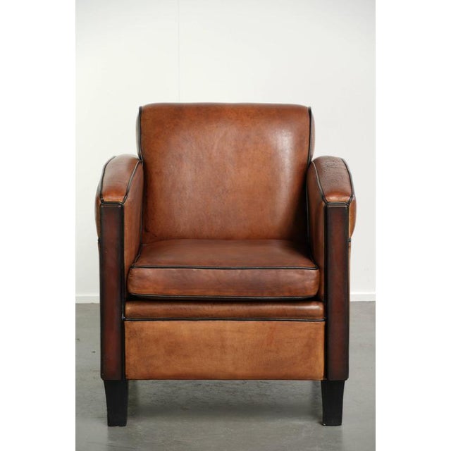 Sheepskin Art Deco design armchair with a great design and beautiful colors. This very interesting Art Deco design...